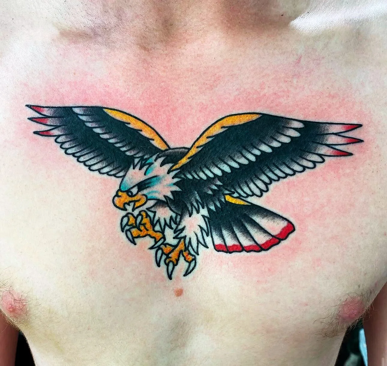 American Traditional Bald Eagle · Chest · 2bit (Chris Curren), Lost at Sea Tattoo, Chinatown Honolulu American Traditional bald eagle diving with spread wings tattoo on chest by 2bit (Chris Curren) at Lost at Sea Tattoo, Chinatown, Honolulu