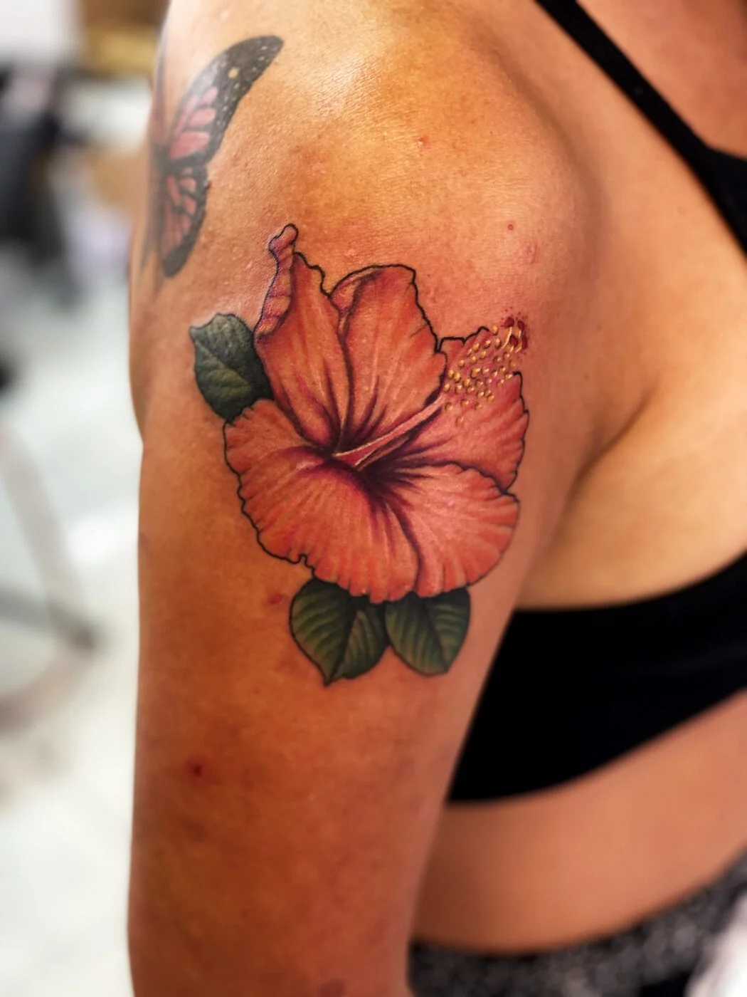 Color Realism orange hibiscus flower tattoo on shoulder by 2bit (Chris Curren) at Lost at Sea Tattoo, Chinatown, Honolulu Color Realism orange hibiscus flower tattoo on shoulder by 2bit (Chris Curren) at Lost at Sea Tattoo, Chinatown, Honolulu