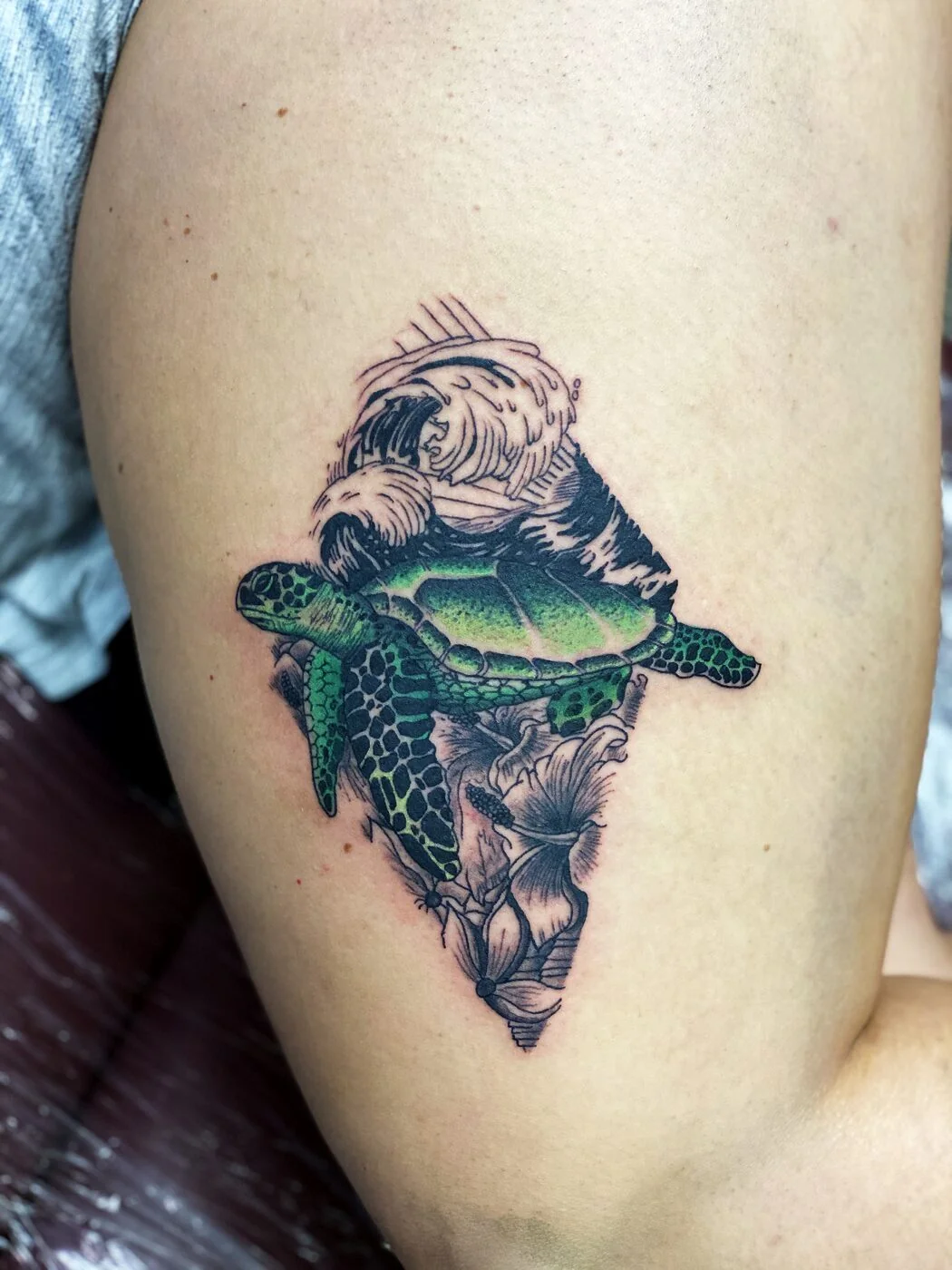 Color Realism sea turtle with wave and hibiscus tattoo on thigh by 2bit (Chris Curren) at Lost at Sea Tattoo, Chinatown, Honolulu Color Realism sea turtle with wave and hibiscus tattoo on thigh by 2bit (Chris Curren) at Lost at Sea Tattoo, Chinatown, Honolulu